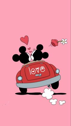 mickey and minnie mouse driving together in a red car with the word love on it