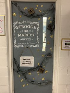 a door with a sign on it that says scrooge and marley