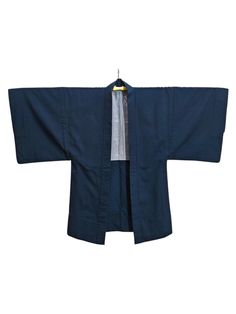 Japanese Blue Abstract Kimono Men's Jacket Haori | Floral Kimono Haori | Kimono Cardigan | Short Kimono Robe | Short Sleeve Please check the measurements we have provided to ensure a proper fit ▪️ MEASUREMENTS ▪️ Width (shoulder seam to shoulder seam: 24.5" Inches. Length (from base of collar to bottom): 37" Inches. End Sleeve to End Sleeve : 54" Inches. Sleeve Drop Length : 18" Inches. Made in Japan Good Condition. Please enlarge the photos to get clear image. Please note that the actual color might be a bit different from pictures due to the lighting.  All measurements are taken with the garment flat on the ground. Customs Tax or Fees will be declare as gift and the value of item is declare lower than purchase price. Item is used and vintage, don't expect it to be like new. Thanks for vi Blue Samurai Style Long Sleeve Kimono, Blue Cotton Outerwear With Kimono Sleeves, Traditional Blue Outerwear With Kimono Sleeves, Traditional Blue Long Sleeve Kimono, Traditional Blue Outerwear With Stand Collar, Short Kimono Robe, Cardigan Short, Short Kimono, Floral Kimono