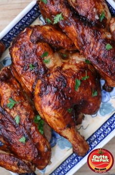 chicken wings on a blue and white platter