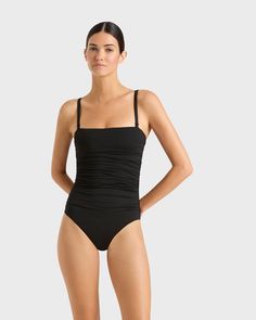 The Raya bandeau one piece in black is one of our all time best sellers. This luxury swimsuit features a gently ruched bodice, straps that detach and invisible under-bust support. Raya is suitable for large busts sizes including D, E and F. Wear Raya to the beach by day or style with Linen Pants for an elevated evening look. Luxury fabric sustainably made in Italy. Garment sustainably made in Australia. Designer Swimsuit, Luxury Swimsuits, Luxury Fabric, Swimsuit Design, Ruched Bodice, Swimsuit Shops, Large Bust, Linen Pants, Luxury Fabrics