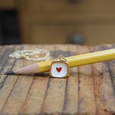 This teeny tiny heart necklace is adorable. It's very dainty and elegant with its velvety gold finish. It would make a great gift for the love of your life.Each piece gets 3 layers of kiln-fired enamel on top of my cast sterling silver shape. I fire these at 1400 degrees for a durable, waterproof and vibrant finish.Each pendant comes on a high quality gold filled chain, choose your length from the drop down menu.I ship First Class Mail in a gift box. Heart Pendant Charm Necklace For Best Friend Gift, Heart Shaped Minimalist Charm Necklace For Best Friend, Minimalist Heart Charm Necklace For Best Friend, Dainty Heart Pendant Charm Necklace For Best Friend, Dainty Heart Charm Necklace For Best Friend Gift, Dainty Heart Charm Necklace For Best Friend, Dainty Heart Pendant Necklace For Best Friend, Heart Shaped Charm Necklace For Best Friend, Heart Charm Pendant Necklace For Best Friend