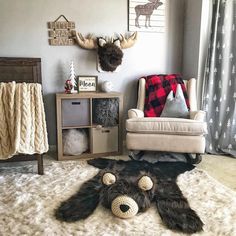 a living room filled with furniture and decor on top of a white carpeted floor