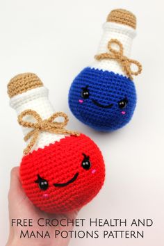 two small crocheted objects are being held by someone's hand, one has a smiling face on it