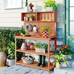 a potted planter sitting on top of a wooden shelf next to a building