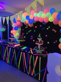 an image of a party with balloons and streamers