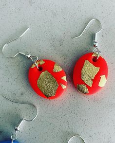 Handmade neon orange polymer clay and gold leaf earrings  Hook fastening Handmade Gold Polymer Clay Jewelry, Handmade Red Earrings For Her, Unique Gold Polymer Clay Jewelry, Handmade Red Earrings Gift For Her, Handmade Red Earrings As Gift For Her, Elegant Orange Resin Jewelry, Gold Polymer Clay Dangle Jewelry, Resin Dangle Jewelry Gift, Red Polymer Clay Jewelry For Gifts