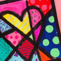 a colorful painting with hearts and dots on it