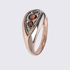 3 Garnet stones Ring in 14K White and Rose GoldDetails and Measurements:► 14 Karat Rose and White Gold► Garnet stone 4 mm► 2 Garnet stones 3 mm► Size 7.75 (Select your size)► Total Weight 4.23 grAll items are Handmade, I pay a lot of attention to every piece.All of my items are hand crafted in Kisufim's Designer jewelry Store in Tel Aviv, and shipped direct to customers all over the world. I am proud to say that many celebrities, models and stars across the world wear my jewelry.►► FREE worldwid Luxury Marquise Ruby Ring Gift, Formal Multi-stone Garnet Rings, Luxury Three Stone Sapphire Ring Gift, Formal Three Stone Rose Gold Ring, Formal Rose Gold Three Stone Ring, Rose Gold Heirloom Three Stone Rings, Heirloom Rose Gold Three Stone Rings, Formal Rose Gold Three Stone Jewelry, Garnet Multi-stone Anniversary Rings