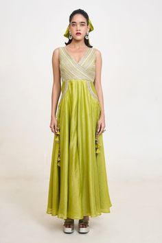 Lime green jumpsuit with lace detailing on the yoke featuring flared bottom and tassel tie-up back. - Aza Fashions Pista Green Sleeveless Party Dress, Embroidered Jumpsuit, Jumpsuit For Women, Jumpsuit Pattern, Green Jumpsuit, Embroidered Silk, Embroidered Lace, Aza Fashion, Lace Detail