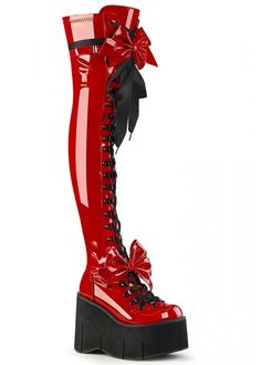 This product is excluded from all promotional discounts and offers.      Demonia's Kera 303 Patent Thigh High Boot is an over the knee shiny red patent boot with platform wedge sole. These awesome alternative black boots have a D-ring lace up front and a full length inside zip with adjustable straps and oversized bows.      Red patent    Over the knee high boot    inside zip and D-ring ace up front    Adjustable straps and removable oversized bows    4.5 black platform wedge Thigh High Platform Boots, Harajuku Street Style, Demonia Boots, Demonia Shoes, Attitude Clothing, Elegant Moments, Flatform Sandals, Thigh Boot, Thigh High Boots