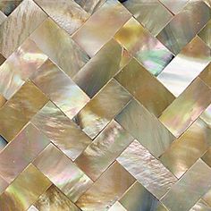 an image of a mosaic tile pattern that looks like it is made out of mother of pearl