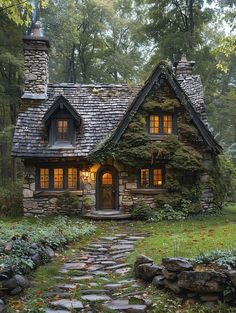 a small stone cottage in the woods