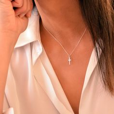 "Minimal, Elegant Cross Necklace. Looking for: -a Dainty Cross Necklace for protection -a Feminine Elegant Cross Necklace for every day wear or - a unique delicate gift to your sister or daughter Whatever the reason may be, this Delicate Cross is perfect for every occasion. This Religious pendant is the PERFECT GIFT for every Woman. So delicate and feminine. We use only HIGH QUALITY materials and offer guarantee on our necklaces. We are a 5-Star Seller. Check our reviews and see what our custome White Necklace With Simple Design For Gift, White Necklace With Simple Design As Gift, Simple White Necklaces As Gift, Minimalist Cross Necklace For Everyday, Minimalist White Gold Cross Necklace As Gift, Minimalist Cross Pendant Necklace For Everyday Wear, Minimalist Cross Pendant Necklace As Gift, Minimalist Cross Pendant Necklace For Gift, Minimalist White Gold Cross Necklace For Gift