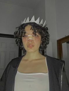 a woman wearing a crown on her head