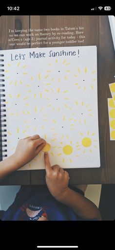 someone is writing on a notebook with yellow sprinkles and the words let's make sunshine