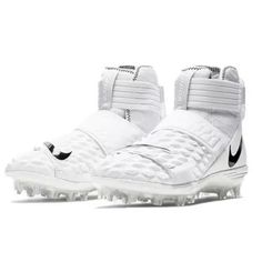 the nike vapor football cleats are white and black