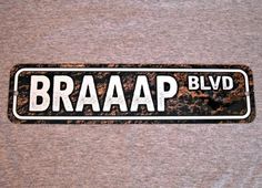 a sign that says braap blvd on it's front and back