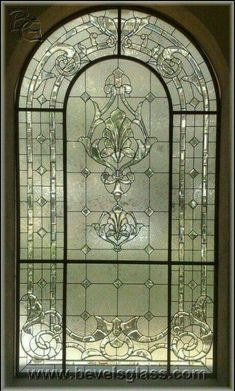 a stained glass window with an ornate design