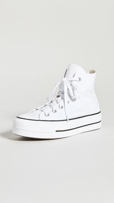 Fabric: Canvas.Removable insole.Signature logo patch.Lace-up closure.Rounded toe.Rubber sole.Imported, Vietnam.This item cannot be gift-boxed Pink High Top Converse, Pink High Tops, Converse Platform, Chuck Taylor All Star Lift, Birthday Fits, Top Sneakers Women, Fabric Canvas, High Sneakers, Shoe Inspo