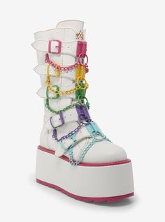 Get yourself a pair of boots that are as unique as you! This white pair of platform boots features buckle strap detailing down the front with colorful hardware and chain detailing. Back zipper closure.Listed in women's sizes.Platform: 3''Heel: 6" Vegan patent leather upper; rubber soleImported Hot Topic Shoes, Yru Shoes, Silly Clothes, Dress Design Sketches, Crazy Shoes, Character Outfits, Looks Vintage, Platform Boots, Punk Fashion