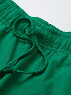 Details: Bright parrot green hue with a special batik wash Elastic waist + drawstring design Fine embroidery label, fine embroidery work Loose small A-line fit Materials & Care: Cotton 100% Hand wash | Dry clean Do not bleach Size & Fit: Model is 5'7", Bust 32, Waist 24, Hips 35, wearing a size S Item #: IM2PA27 Casual Green Bottoms With Drawstring, Green Cotton Drawstring Shorts, Green Drawstring Shorts For Spring, Green Cotton Loungewear Shorts, Green Cotton Shorts For Loungewear, Green Loungewear Shorts With Elastic Waistband, Green Drawstring Shorts, Casual Kelly Green Bottoms For Spring, Casual Kelly Green Bottoms For Summer