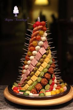 a platter filled with lots of different types of food