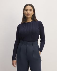 Meet the Viscose Knit Crew. This piece features a slim fit, crew neck, long sleeve, wide rib texture, and slits at the side seams for comfort, in a blend of viscose stretch + recycled nylon. Stretch Fine Knit Long Sleeve Top For Work, Crew Neck Fine Knit Long Sleeve Top For Work, Fine Knit Long Sleeve Crew Neck Top For Work, Workwear Fine Knit Long Sleeve Crew Neck Top, Versatile Ribbed Sweater For Work, Versatile Ribbed Workwear Sweater, Ribbed Long Sleeve Knit Top For Work, Everlane Long Sleeve Sweater, Long Sleeve Ribbed Top For Work