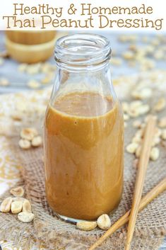 a jar filled with peanut butter sitting on top of a table