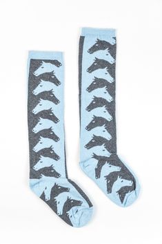 Forza Cavallo classic knee-high socks are a cozy accessory made from the finest environmentally conscious fibers: 68% recycled cotton, 17% recycled polyester, 14% nylon and 1% spandex. These horse socks provide comfort and support with an eye-catching, interwoven horse motif inspired by artist M. C. Escher. A perfect accessory to be worn alone or under boots. A great equestrian gift for any occasion, and perfect for horse lovers of any age. Blue Knee-high Winter Socks, Fitted Blue Knee-high Socks For Winter, Fitted Blue Knee-high Socks, Fitted Blue Socks For Fall, Fitted Blue Winter Socks, Horse Socks, M C Escher, Horse Motif, Cozy Accessories