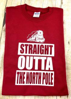 **POLAR EXPRESS STRAIGHT OUTTA THE NORTH POLE** Polar Express t shirts, kids t shirts Polar Express Christmas t-shirts, family matching shirts matching Christmas shirts, infant ribbed sleeper-(t shirt material) Short sleeve and long sleeve available in t shirts Soft cotton blend 4.5 oz Unisex fit. Machine washable/ tumble dry low Christmas train, polar express, matching family shirts **all sales final** Xmas T Shirts, Xmas Shirt Ideas, Polar Express Party, Christmas Pajama Party, Christmas Cricut, Matching Family Christmas Pajamas, Cricut Air, Diy Shirts, Matching Christmas Shirts