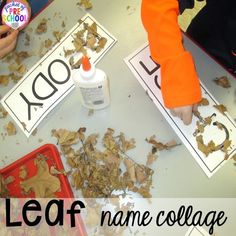 children are playing with leaf name collages on the table in front of them