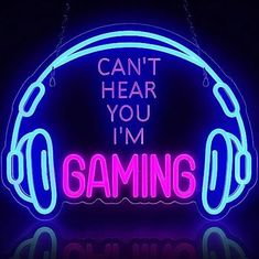 a neon sign that says can't hear you i'm gaming with headphones