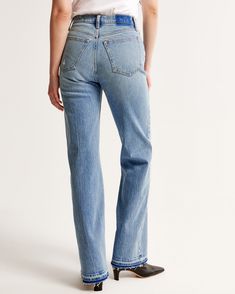 Our classic relaxed jeans in a medium wash with a let-down hem. This fit features a 10.5” high rise, is fitted at the waist and hips, and eases at the thigh into a relaxed, full-length leg shape. This jean is made from our vintage stretch fabric which features both an authentic vintage look and contains slight built-in stretch for additional comfort. Fitted Flare Jeans In Faded Rigid Denim, Medium Wash High Rise Relaxed Fit Flare Jeans, Classic Denim Flare Jeans With Frayed Hem, Medium Wash Relaxed Fit Flare Jeans In Recycled Denim, Medium Wash Relaxed Fit Flare Jeans In Rigid Denim, Relaxed Fit Medium Wash Recycled Denim Flare Jeans, Relaxed Fit Medium Wash Flare Jeans In Recycled Denim, Fitted Flare Jeans With Frayed Hem In Rigid Denim, Relaxed Fit Flare Jeans In Medium Wash Recycled Denim