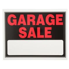 a garage sale sign with the words garage sale written in red on black and white