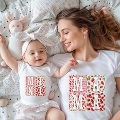 "Mama and Mini" shirts Strawberry print are a delightful expression of love and connection between a mother and her child. These matching sets typically consist of two shirts: one for the mother and one for her child, symbolizing the special bond shared between mother and child.  These shirts are perfect for everyday wear, family outings, special occasions, or even as adorable photo props for capturing cherished moments together. These shirts not only showcase the inseparable connection between Mom And Daughter Shirts, Mama And Mini Shirts, Mini Shirts, Strawberry Shirt, Family Outings, Leopard Shirt, Daughters Shirt, Mom And Daughter, Mommy And Me Outfits