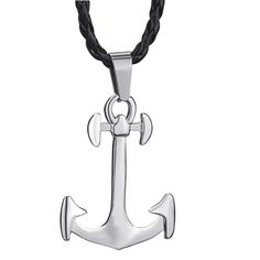 The anchor is a known symbol that represents safety and security. This symbol is crafted into a lovely silver pendant crafted from lead-free zinc pewter alloy. This piece features a clean cut, highly polished silver design set in a 45 mm x 27mm piece. A 24" long black knotted leather rope necklace completes this Innovato Design accessory. A silver link extender chain lengthens the leather rope necklace, allowing wearers to adjust the size of the piece.  Product Highlights    Made from lead-free zinc pewter  Simple Anchor Pendant Design  Black Knotted Leather Rope Necklace Dolphin Bracelet, Wood Inlay Rings, Arrow Ring, Punk Accessories, Anchor Pendant, Masonic Ring, Wooden Sunglasses, Gothic Rings, The Anchor