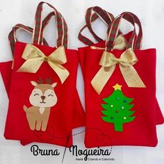 two red bags with gold bows and reindeers on them, one has a christmas tree