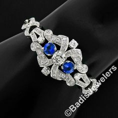 "Here we have an absolutely stunning art deco period bracelet, which was crafted from solid .900 platinum, featuring a GIA certified old European cut diamond at its center flanked by a pair of natural royal blue sapphires. The center diamond weighs exactly 1.14 carats and is certified to be K in color and an eye-clean SI1 clarity. The sapphires are a gorgeous well-matched royal blue color and are exceptionally brilliant. The open work is immaculate and the entire piece is framed with very fine m Royal Blue Color, Art Deco Period, European Cut Diamonds, Statement Bracelet, 14k Gold Ring, Antique Art Deco, Diamond Fashion, Solitaire Engagement, Antique Art