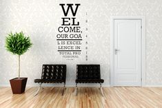 a wall decal with the words we're welcome in black on a white background