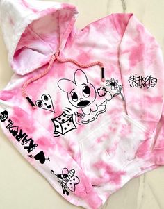 "I hope you like this inspired tie-dye hoodie as much I do .🥹  this art piece must be in your wardrobe . 💕Mañana será bonito bichota season⛓️💣 🌸 karol g..  **Select Your sweatshirt Size* ** Choose Your Quantity you want. **Click ADD TO CART. And, you can go back to add more product color for your family members or You can complete the checkout process. **Please Click \"Proceed to Check Out\" **Finally, Your order will be ready to ship 3-7Business Day." Cotton Tie Dye Hoodie For Spring, Trendy Tie Dye Hoodie For Streetwear, Tie Dye Hoodie With Graphic Print For Streetwear, Karol G T Shirt Ideas, Spring Tie Dye Cotton Hoodie, Karol G Sweater, Karol G Jersey, Karol G Tshirts, Tie Dye Graphic Print Hoodie