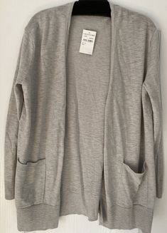 Madewell Cotton Blend Open Front Pocket Cardigan Sweater Silver Gray Women’s size XS. . Condition is "New with tags". Shipped with USPS Priority Mail Padded Flat Rate Envelope. Shipping only in the continental US Thank you! Pocket Cardigan, Grey Women, Front Open, Priority Mail, Cardigan Sweater, Front Pocket, Madewell, Sweater Cardigan, Envelope