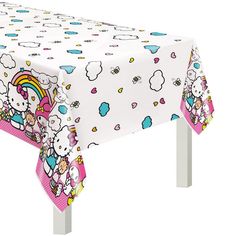 the table cloth has hello kitty on it