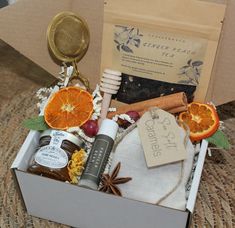 an open box filled with various items on top of a table