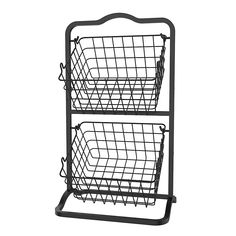 two metal baskets sitting on top of each other in front of a white background,