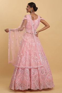 Pastel pink lehenga with attached can-can, all over Mughal pattern, tonal thread, stone and mirror embroidery. Paired with 3D floral applique work padded blouse and bordered dupatta. - Aza Fashions Designer Pink Lehenga With Sheer Dupatta, Pink Sharara With Dori Work, Pink Sharara With Dori Work For Reception, Pink Saree Set With Dori Work, Pink Gown With Cutdana In Saree Shape, Pink Gown With Cutdana Details In Saree Shape, Pink Floor-length Pre-draped Saree For Eid, Designer Pink Lehenga With Cutdana, Designer Pink Lehenga With Cutdana Detail