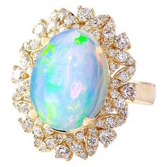 an opalite and diamond ring, by van cleef in yellow gold