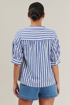 This top will make your outfits look extra cute! Lightweight blue and white stripes give a perfectly nautical look over short puff sleeves and a split neckline. Combine it with jeans or shorts to complete a chic look! - Striped- Split neckline- Puffed short sleeves- Relaxed fit- Color: Blue stripeSize + Fit - Model is 5'8" and wearing size XS- Measurements taken from size S - Chest: 21"- Length: 24 1/2" Fabric Self: 100% Cotton Style Number STT17276 Tank Top Bodysuit, Nautical Looks, Stripe Outfits, Shoes For Leggings, Jumpsuit Shorts Rompers, Boys Jacket, Midi Maxi Dress, New Arrival Dress, Cotton Style