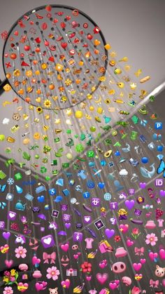 a shower head with lots of colorful buttons on it