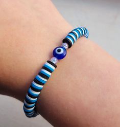 Evil eye clay bead bracelet for protection. Clay Bead Bracelet Ideas With Evil Eye, Evil Eye Bracelet Meaning, Evil Eye Clay Bead Bracelet, Evil Eye Clay, Eye Clay, Evil Eye Jewelry Bracelet, Clay Bead Bracelet Ideas, Bead Bracelet Ideas, Evil Eye Beaded Bracelet